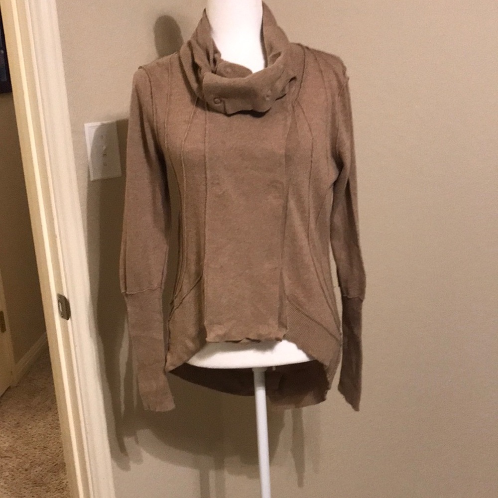 Chelsea and Violet -sweater with 2 rows of snaps, back at bottom is asymmetrical